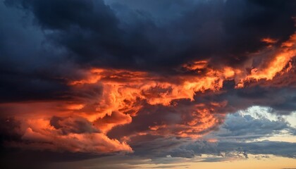 Fototapeta premium fiery red and black sky clouds thunderclouds dramatic sky with heavy clouds