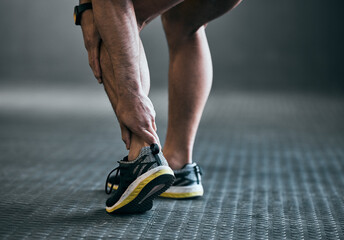 Fitness, man and ankle pain from training injury with workout accident, muscle tension and sprain...