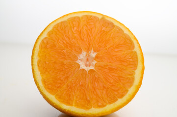 Fresh oranges half isolated on white background