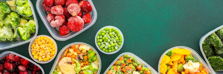 Preparing food for the winter, freezing fresh vegetables in the summer in the refrigerator, various frozen vegetables in plastic dishes on a green background, banner