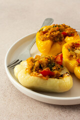 Stuffed bell peppers with quinoa, lentils, and fresh vegetables offer a delicious and healthy breakfast or lunch option, packed with protein, fiber, and vibrant flavors