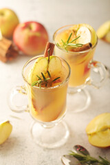 Warm apple autumn drink with cinnamon