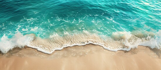 Obraz premium Scenic beach with crystal clear turquoise sea on the side giving a serene and picturesque view with copy space image