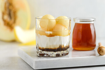 dessert with melon in a glass