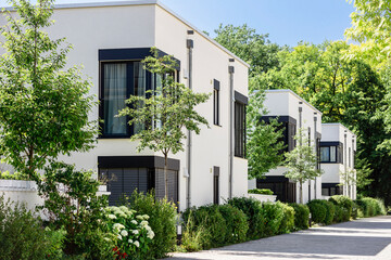 Modern Apartment Building in Green City. Low-rise Residential Buildings with Modern Exterior Design...