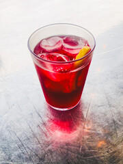A glass of 'vino tinto', red wine with lemonade, typical Spanish drink
