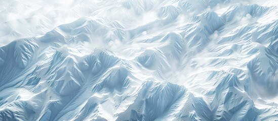 Obraz premium Scenic winter setting with snowy terrain showing intricate wind carved patterns Ideal for backgrounds and designs with a top down view featuring a blank area for adding text or images