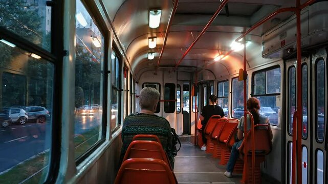 People riding the tram in the evening in Bucharest, Romania