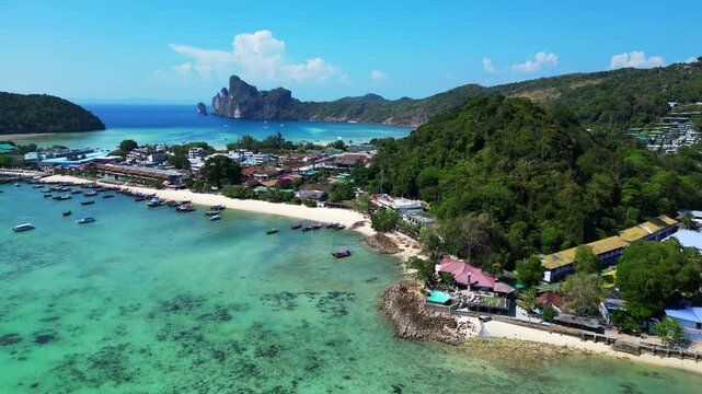 Phi phi island tonsai pier with boats docked Beautiful aerial view flight drone