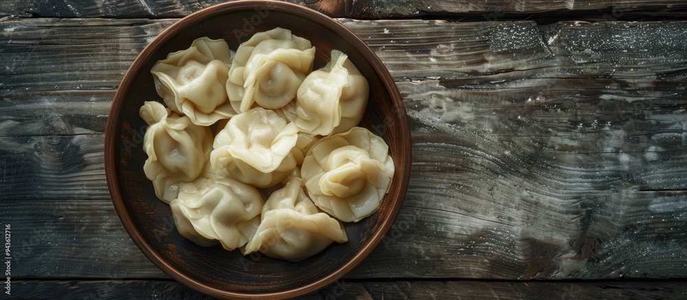 Aufkleber A restaurant setting displays a plate of freshly cooked Georgian Khinkali dumplings with empty space for text or other design elements in the image. Creative banner. Copyspace image