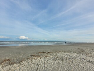 Blue sky over a sandy beach