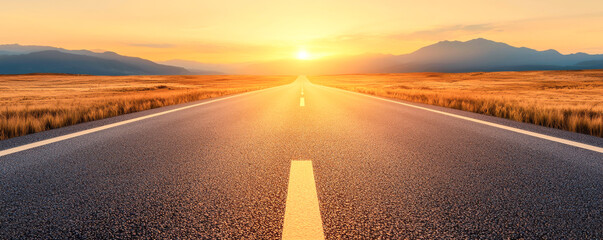 A breathtaking view of a straight road leading towards a bright sunrise over mountains and golden fields.