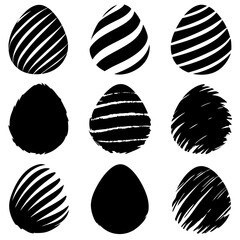 Elegant black and white eggs with unique patterns on surfaces