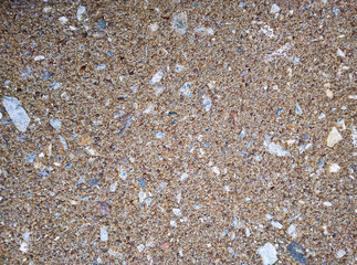 Natural stone texture wall and floor background tile. Exposed aggregate surface. Decorative grinded concrete with small stones.