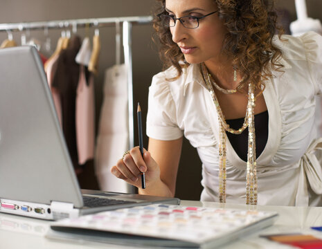 Woman Working on Laptop Computer