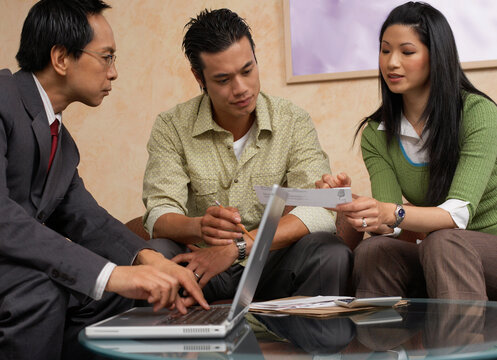 Man and Woman Meeting with Accountant