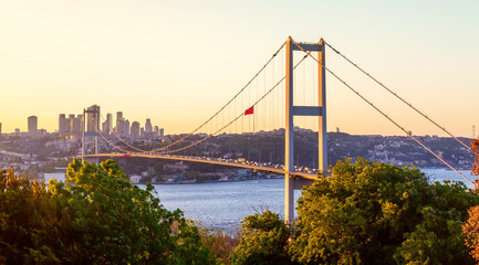 Istanbul Bosphorus Bridge or 15th July Martyrs Bridge at sunset. Istanbul, Turkey.