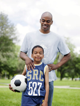 Portrait of Father and Son Outdoors