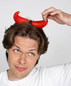 Man with Devil's Horns