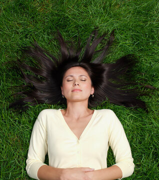 Woman Lying on Grass