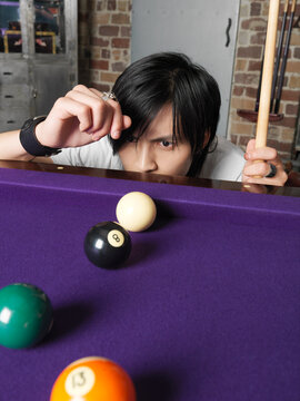 Man Playing Pool