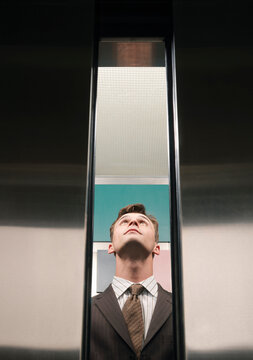 Businessman in Elevator