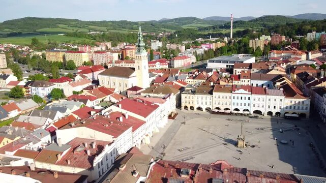 Sigmund Freud Square in Př&iacute;bor, with church, colorful rooftops, and surrounding landscape