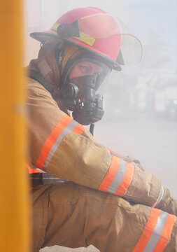 Firefighter in Doorway of Smoke-filled Building