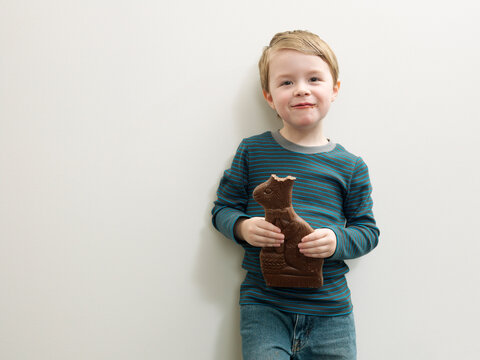 Boy Eating Chocolate Bunny