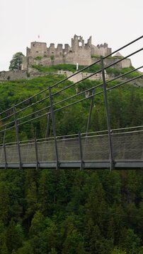 Reutte, Tyrol, Austria - The Highline179 Suspension Bridge and Ehrenberg Castle - Wide Shot