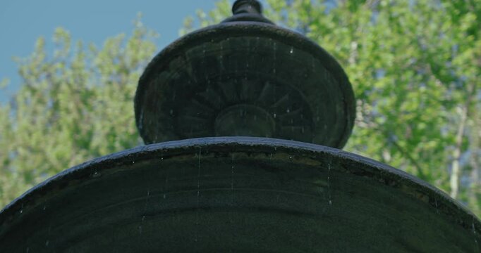 water fountain detail in Zrinjevac Park, Zagreb, with water gently cascading down
