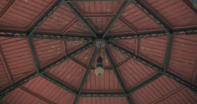 Ornate wooden ceiling of a historic gazebo in Zrinjevac Park, Zagreb
