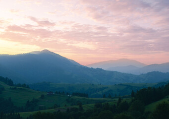 Fototapeta premium The blue mountain on a sunset scene of the Carpathian mountains. Ukraine.