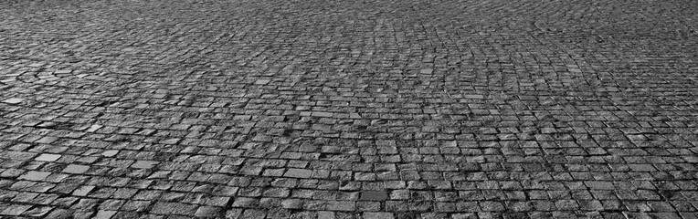 Old square cobble stone. paving perspective background. Paved stone pavement texture Cobblestone...