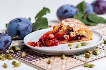 Slices of plum cake with cardamom.