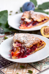 Slices of homemade plum pie.