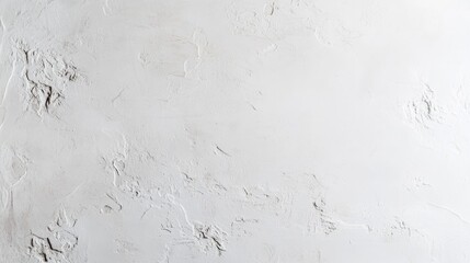 Fototapeta premium Smooth white wall with a soft, even texture, ideal for use as a neutral background in photography or design projects.