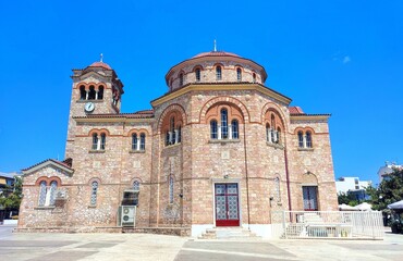Fototapeta premium Exterior view of the Church of Ypsosi Timiou Stavrou at Aigaleo, located on Plateia Estavromenou, a central square in the municipality of Aigaleo in western Athens.