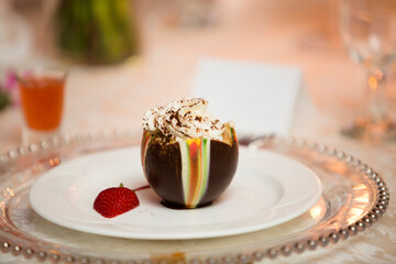 Ice Cream in Chocolate Cup topped with Whipped Cream at Wedding