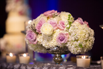 Rose and Hydrangea Centerpieces on Table at Wedding