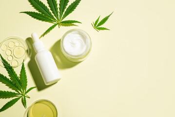 Hemp cannabis leaves and CBD oil cosmetic products