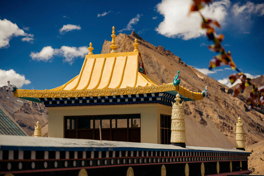 Close up of the architectural details of Key Monastery and buddhist prayer flags in Himachal Pradesh, India; Spiti Valley, Himachal Pradesh, India