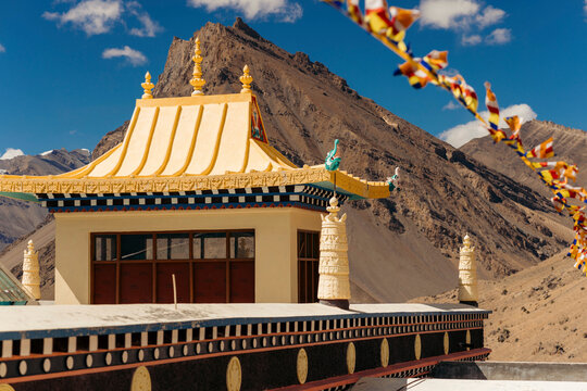 Close up of the architectural details of Key Monastery and buddhist prayer flags in Himachal Pradesh, India; Spiti Valley, Himachal Pradesh, India