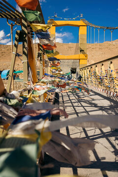 Chicham Bridge with Buddhist prayer flags over Spiti Valley in Northern India; Himachal Pradesh, India
