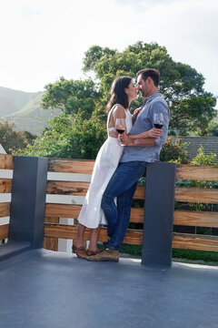 Couple embracing on terrace