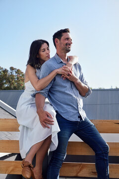 Couple embracing on terrace