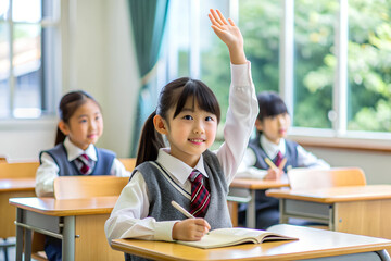 In the classroom, a little Asian girl raised her hand to answer the teacher's question