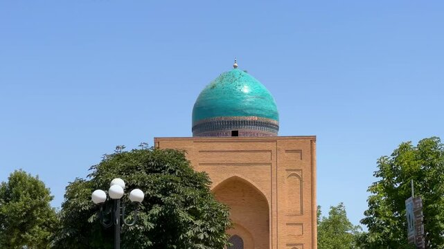 View of the Bibi Khanum Mausoleum. Samarkand, Uzbekistan - June 9, 2023. One of the most important monuments of Samarkand, a popular tourist destination in Central Asia. 4K