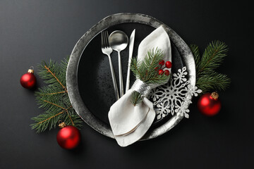 Christmas setting with festive decor on dark table, flat lay