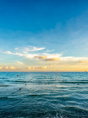 Seascape view with white sand, quiet beach, clear sea water, blue sky in summer of Koh Samet (Samet Isalnd) in Thailand